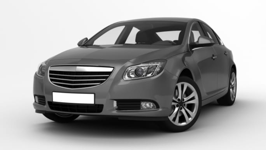 Modern metallic grey sedan vehicle parked against a studio background