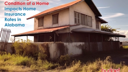 An old, two-story house with a rusted tin roof set in a rural area
